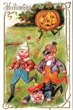 Vintage Boys chased by JOL Anthropomorphic Pumpkin Halloween Postcard (RARE)