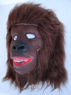 Masque en latex complet pour Halloween avec des cheveux de gorille singe voyageur des années 1970 vintage rare