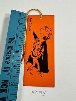 The translation in French is: Carte de comptage de la parade des lanternes rares Halloween Hallmark Vtg elf Pumpkin Parade